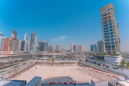 Fully Furnished 1BR Apartment with Burj & Canal View in 15 Northside